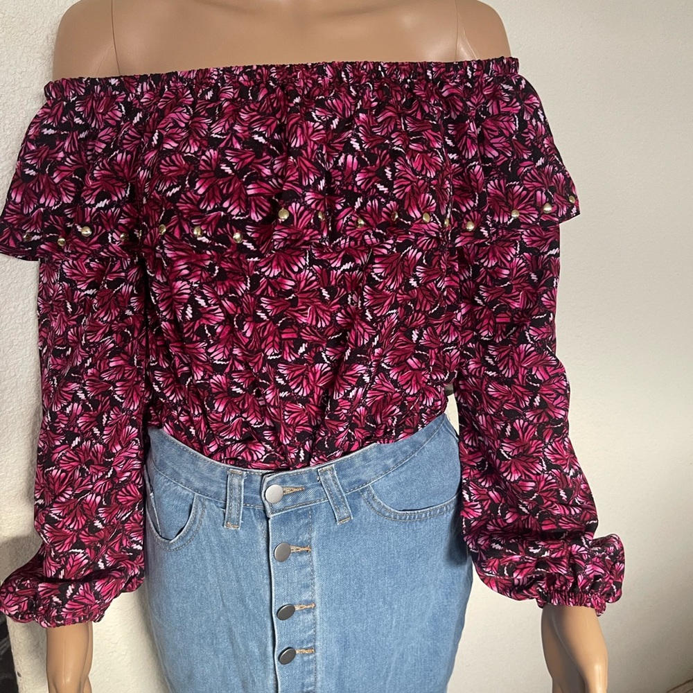 Elegant beautiful off the shoulders blouse.